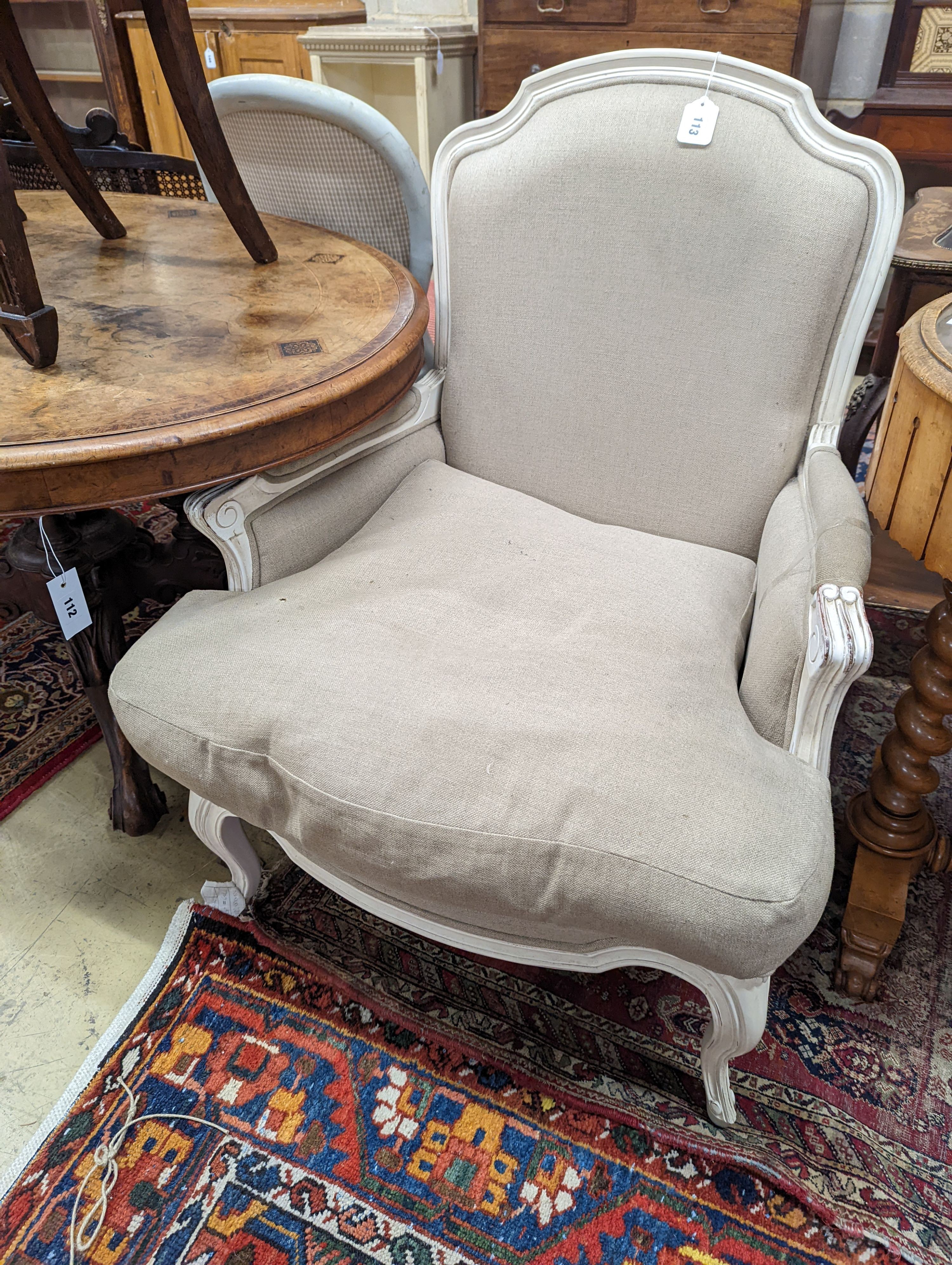 A French painted upholstered armchair, width 71cm, depth 70cm, height 94cm